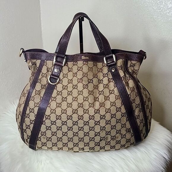Gucci Handbags - 💯Authentic Gucci Tote Handbag 🍀